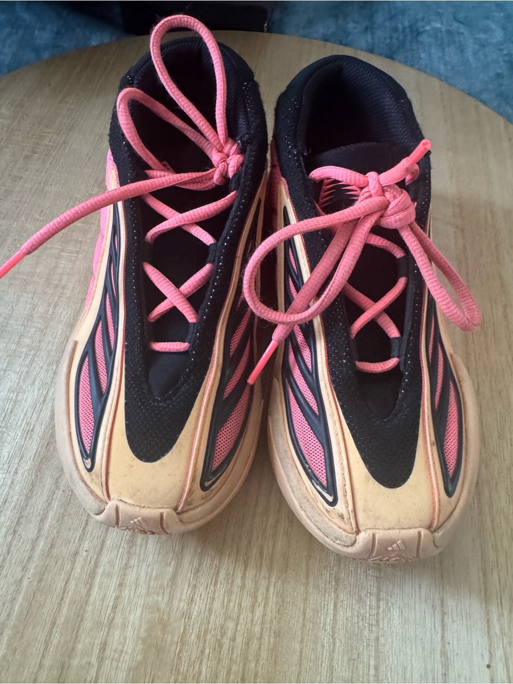 Anthony Edward’s 2 With Love Kids Black and Orange athletic sneakers